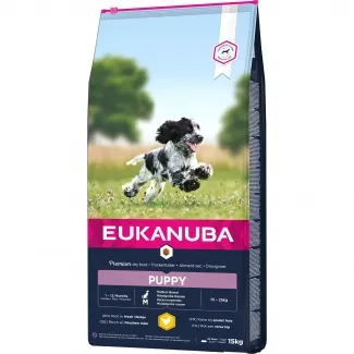 Eukanuba Dog Puppy Medium - Балансирана храна за подрастващи кученца от средни породи на възраст - между 2 и 12 месеца със сушено пилешко и пуешко месо, 15 кг.