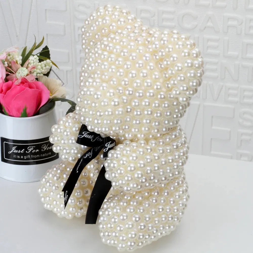 Мече от блестящи перли в луксозна опаковка с панделка 7