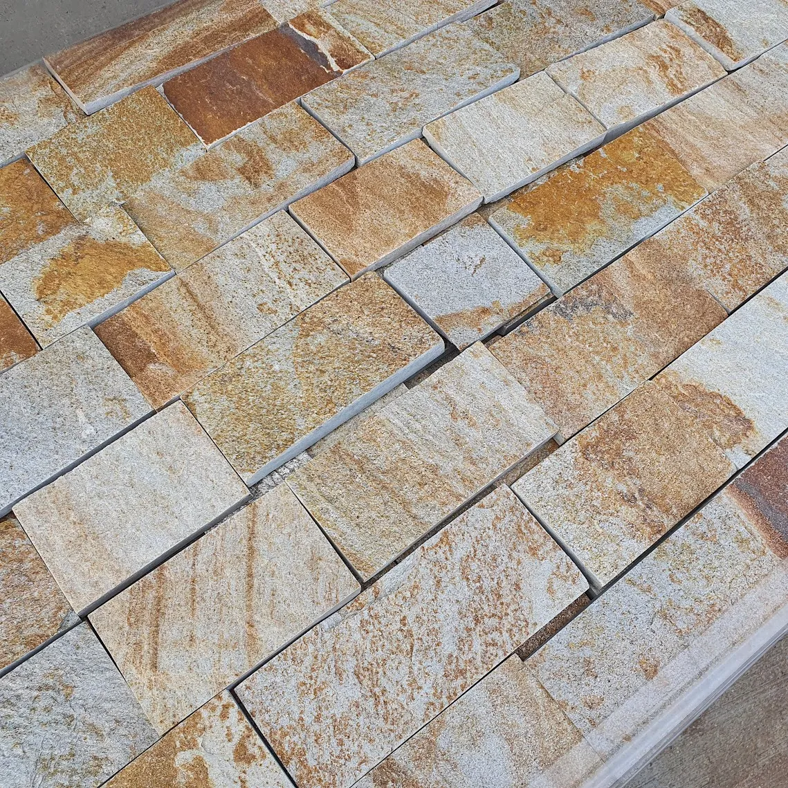 Sandy-gold gneiss machine-cut tiles 4