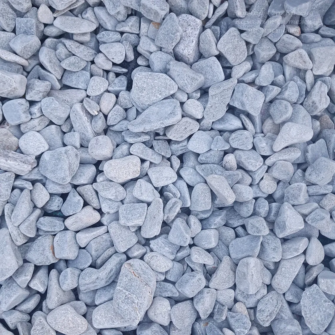 Blue-gray tumbled stones from gneiss per tonne in a big bag  19